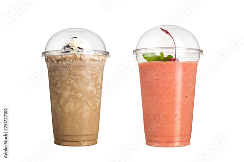 Delicious fruit smoothies in plastic cups, on a white background. Two milkshakes with chocolate and cherry flavored.