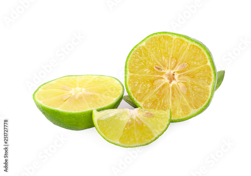 whole and half with slice of fresh green lime isolated on white background