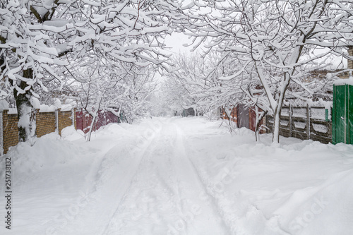 Snowfall in village street