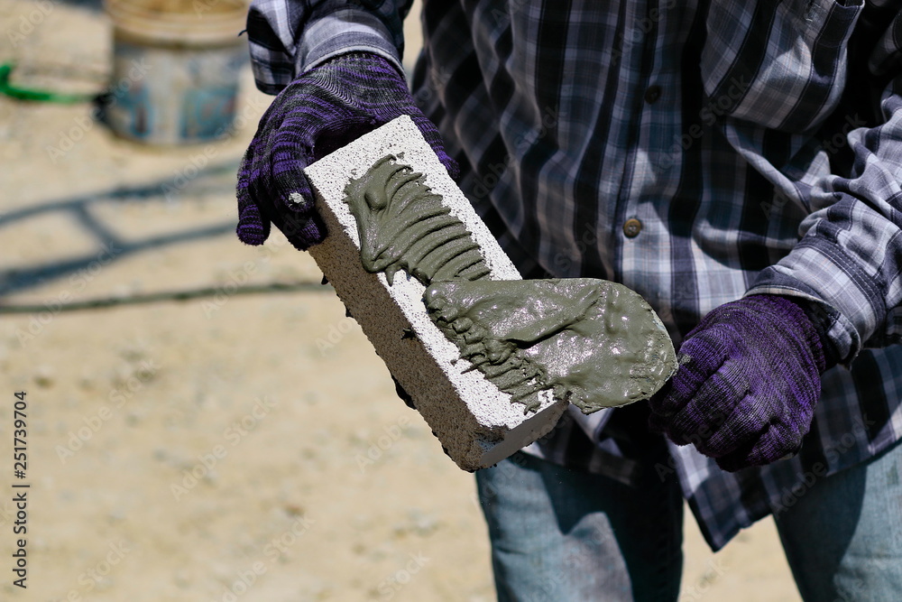 Construction technicians are building brick walls with lightweight bricks. Construction technicians are building brick walls with lightweight bricks.