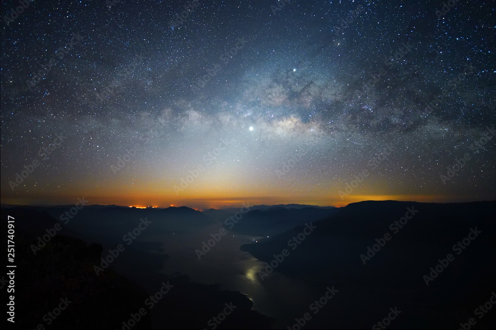 Landscape Milky Way rises over on mountain Pha Daeng Luang, Mae Ping National Park, Lamphun in Thailand.