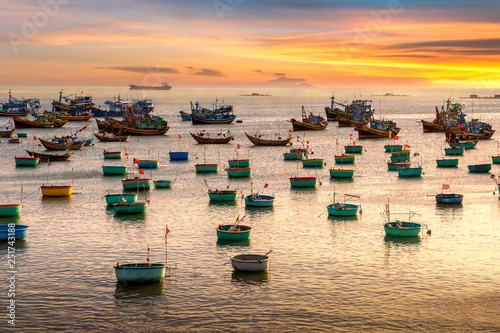 traditional-vietnamese-boat-in-the-basket-shaped-on-fishing-port-at-fishing-village-in-sunset-sky-binh-thuan-vietnam-landscape-popular-landmark-famous-destination-of-vietnam