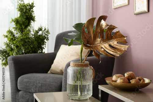 Tropical leaves and plate w...