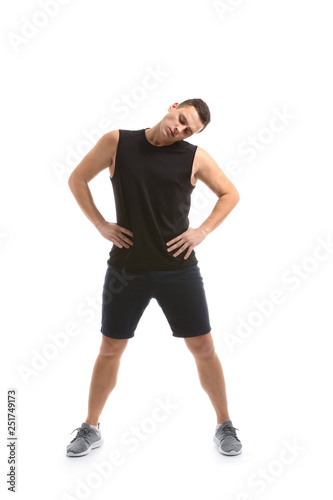 Sporty young man training against white background © Pixel-Shot