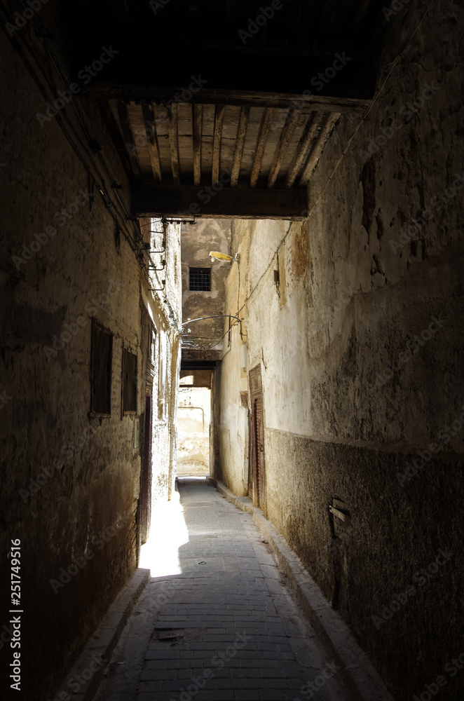 A narrow street at the Medina of Fez, Morocco