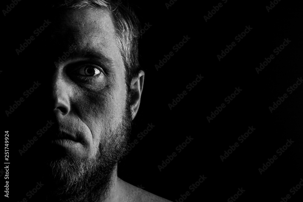 Portrait of a man with a beard on a black background Portrait of a man with a beard on a black background