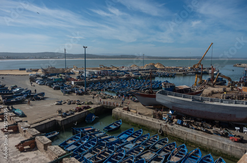 View to fishing boats in Essaouira harbour and cannons in Skala du Port ( Northern Skala ), Morocco