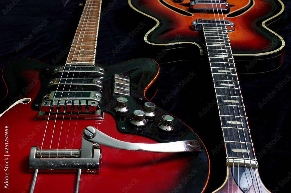 Two electric guitars on dark Two electric guitars on dark