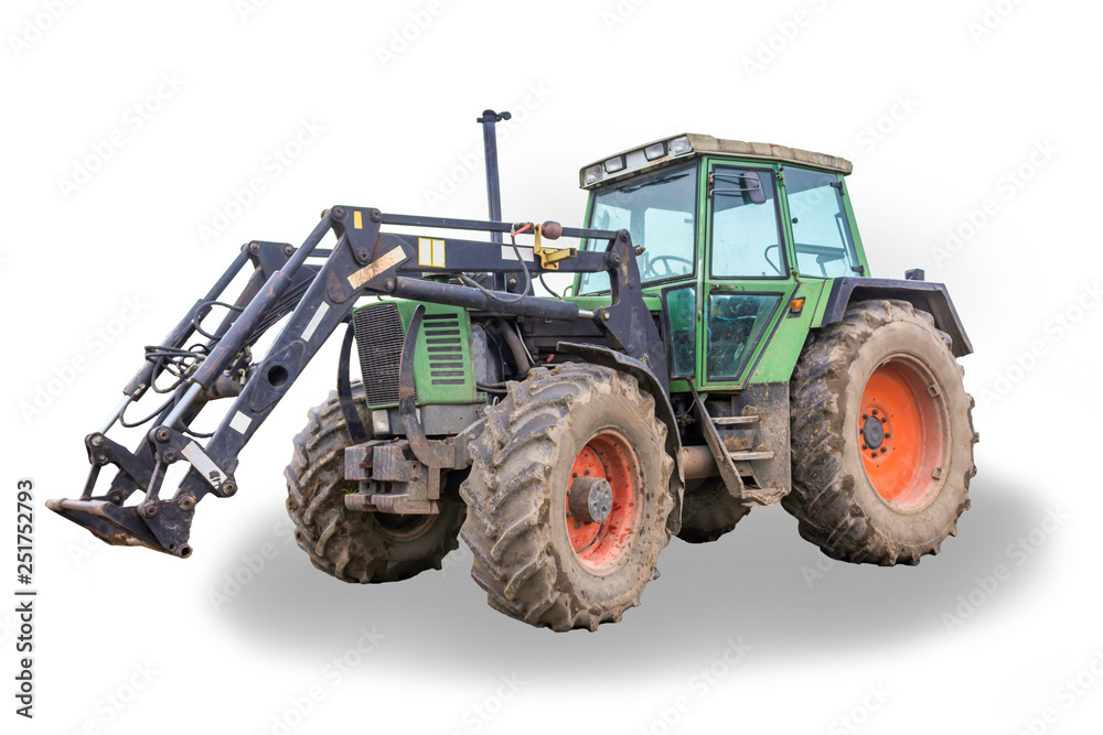 General view of a powerful tractor designed for various works on a country farm. Closed saloon, red wheels. Isolated photo.Equipment for a dairy farm.