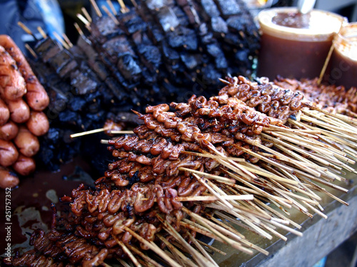 Assorted chicken and pork innards barbecue sold at street food carts photo