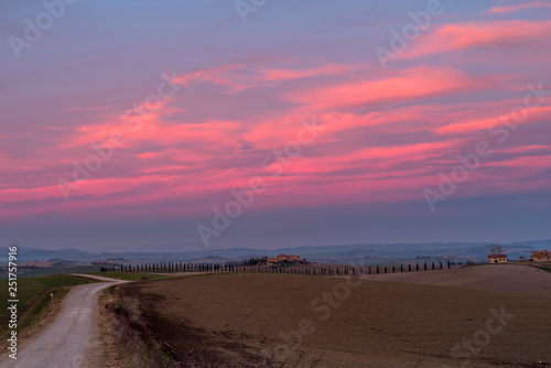 Spectacular sunset on the Sienese countryside in the Ville Di Corsano area, Tuscany, Italy