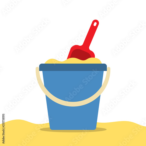 Pail with sand and shovel for a sandbox. Beach toys.