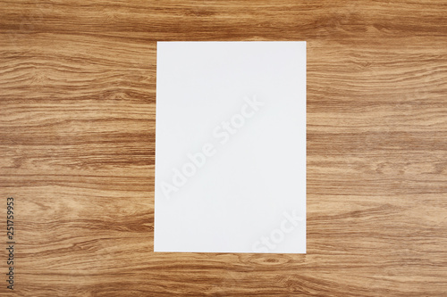 White template paper and space for text on wooden background