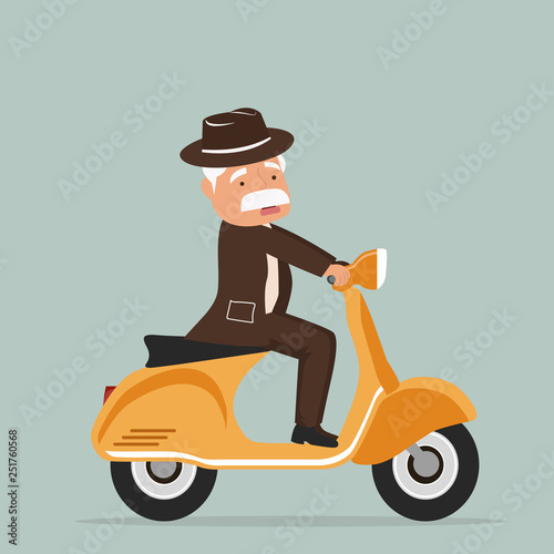 old man riding scooter