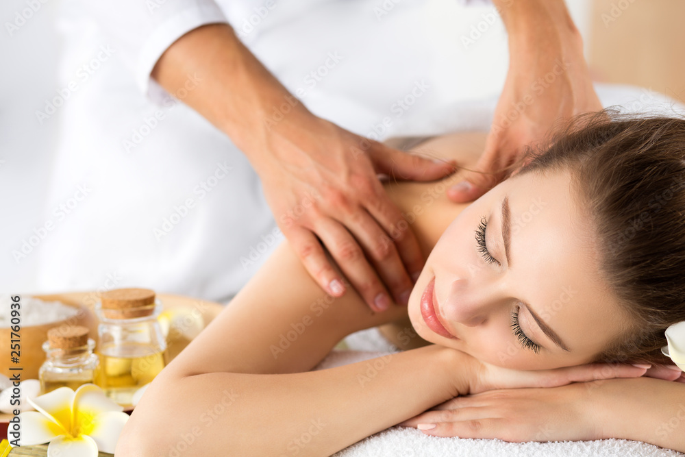 Beautiful young woman laying at spa salon Beautiful young woman laying at spa salon