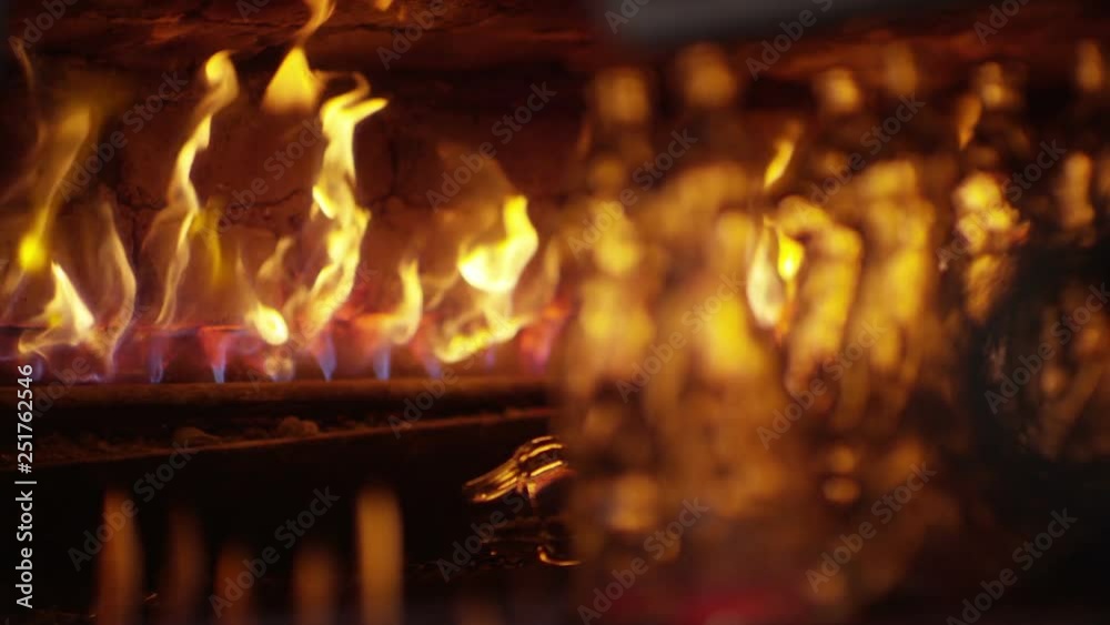 Glassworks manufacturing process . Production of glass bottles . Bottle manufacturing industrial factory . Molten glass . Glass factory . Process of creating glass products . Slow motion . Close up . Glassworks manufacturing process . Production of glass bottles . Bottle manufacturing industrial factory . Molten glass . Glass factory . Process of creating glass products . Slow motion . Close up .