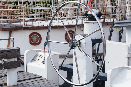 Steel steering wheel on yacht © evannovostro
