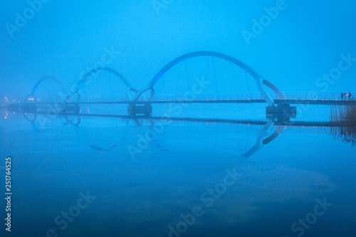 Solvesborgsbron pedestrian bridge in the south of Sweden at dusk photo