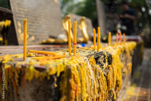 Candles in Wat Jet Yod temple in thailand photo