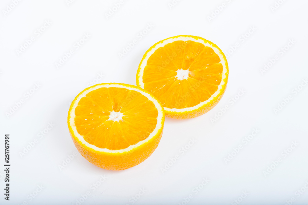 Sliced orange isolated on white. Healthy food, diet and cooking concept. Sliced orange isolated on white. Healthy food, diet and cooking concept.