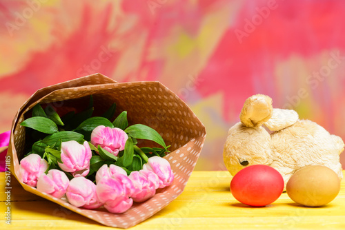 Tulip flower bouquet. Healthy and happy holiday. painted eggs and bunny rabbit. Egg hunt. Happy easter. Spring holiday. Holiday celebration, preparation. Easter Bunnies