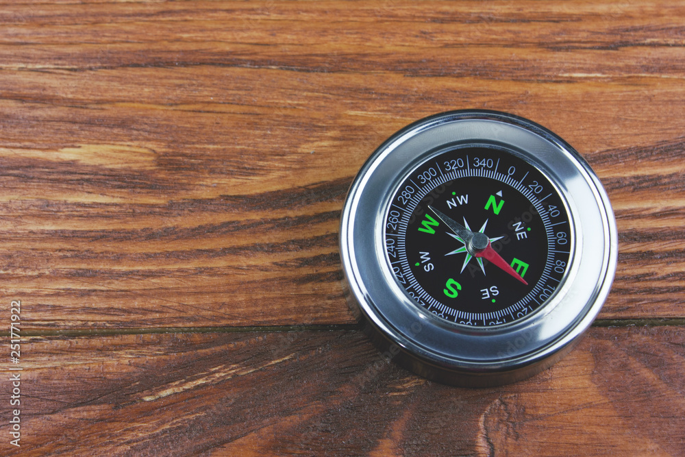 compass on the table .