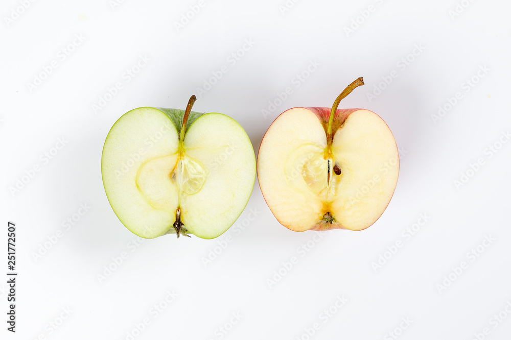 red green apple half cut slice top view on white background