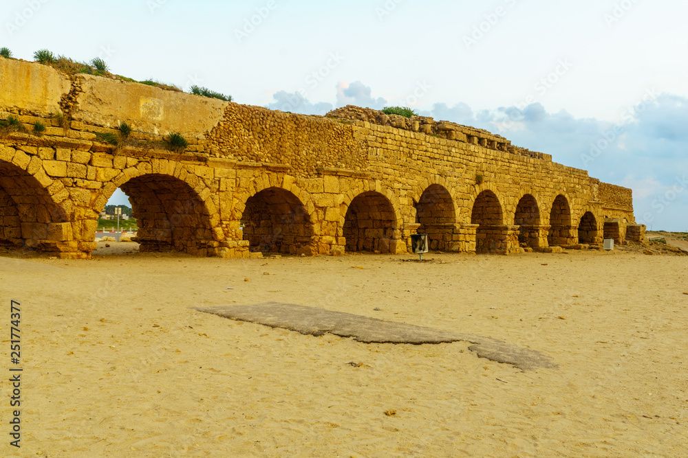 Sunset view of the beach and the Roman Aqueduct in Caesarea