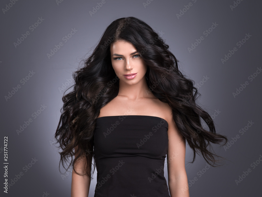 Fototapeta premium Beautiful hair woman long hairstyle brunette female young healthy hair beauty model