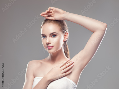 Armpit woman hand up deodorant epilation clean concept photo