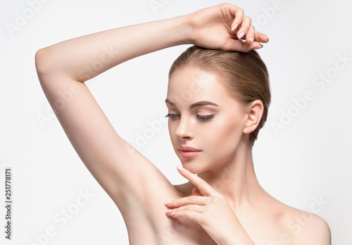 Armpit woman hand up deodorant epilation clean concept photo