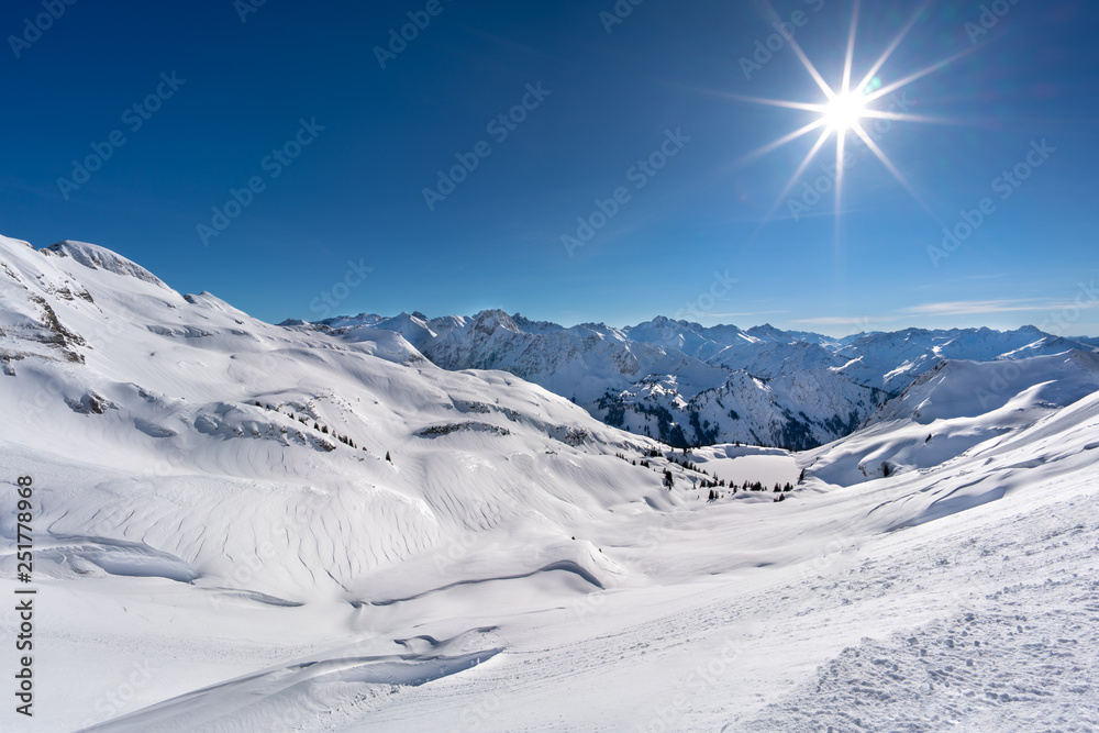 Alpine winter landscape of the Nebelhorn mountain near Oberstdorf, Germany, on a sunny day.