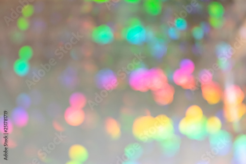 Light abstract background with multicolored spots.