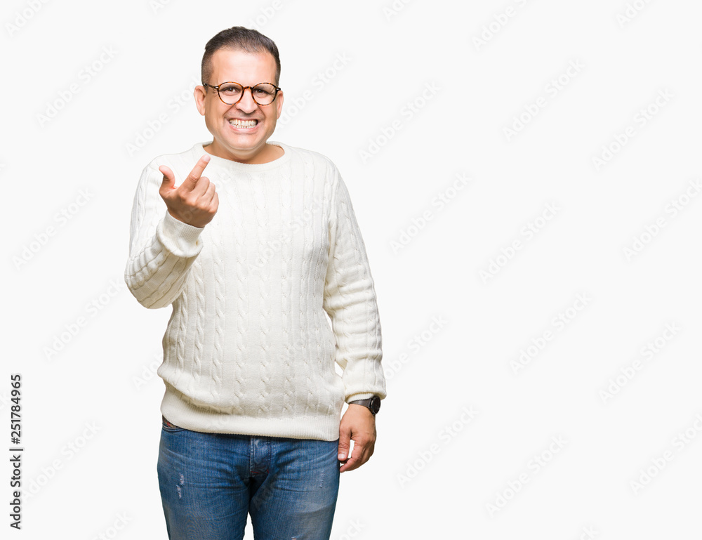 Middle age arab man wearing glasses over isolated background Beckoning come here gesture with hand inviting happy and smiling Middle age arab man wearing glasses over isolated background Beckoning come here gesture with hand inviting happy and smiling