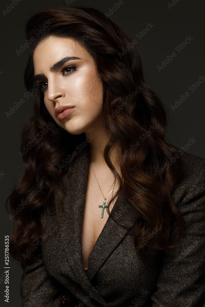 Beauty Hair. Beautiful Woman With Curly Long Brown Hair