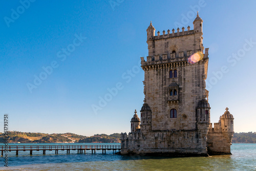 Scenic Belem Tower and wooden bridge miroring with low tides on Tagus River. Torre de Belem is Unesco Heritage and icon of Lisbon and the most visited attraction in Lisbon, Belem District, Portugal