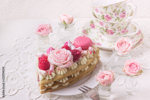 A piece of cake with flowers. Romantic Valentine's Day breakfast.