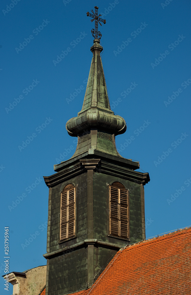 Black bell tower at orthodox church in Serbia