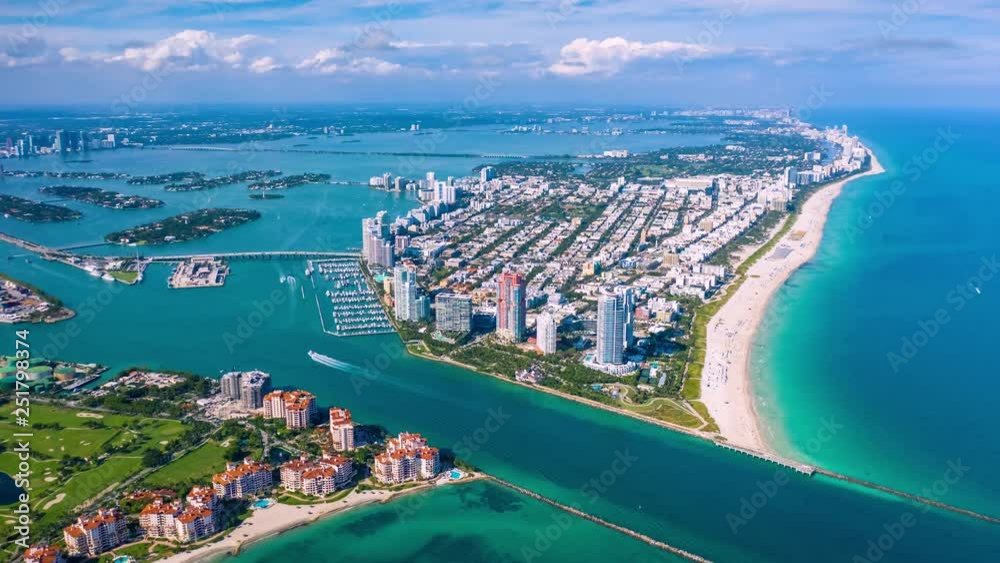 MIAMI, FLORIDA, USA - JANUARY 2019: Aerial hyperlapse 4k drone panorama view flight over Miami beach ocean coastline.