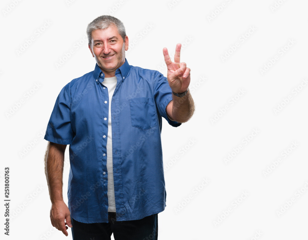 Handsome senior man over isolated background smiling with happy face winking at the camera doing victory sign. Number two. Handsome senior man over isolated background smiling with happy face winking at the camera doing victory sign. Number two.