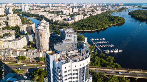 Top view of the construction site of a residential high-rise building on Dniepr river photo