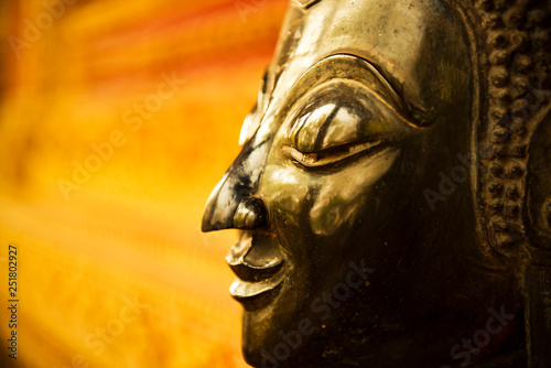 The Buddha face used as an amulet of Buddhism in Asia.