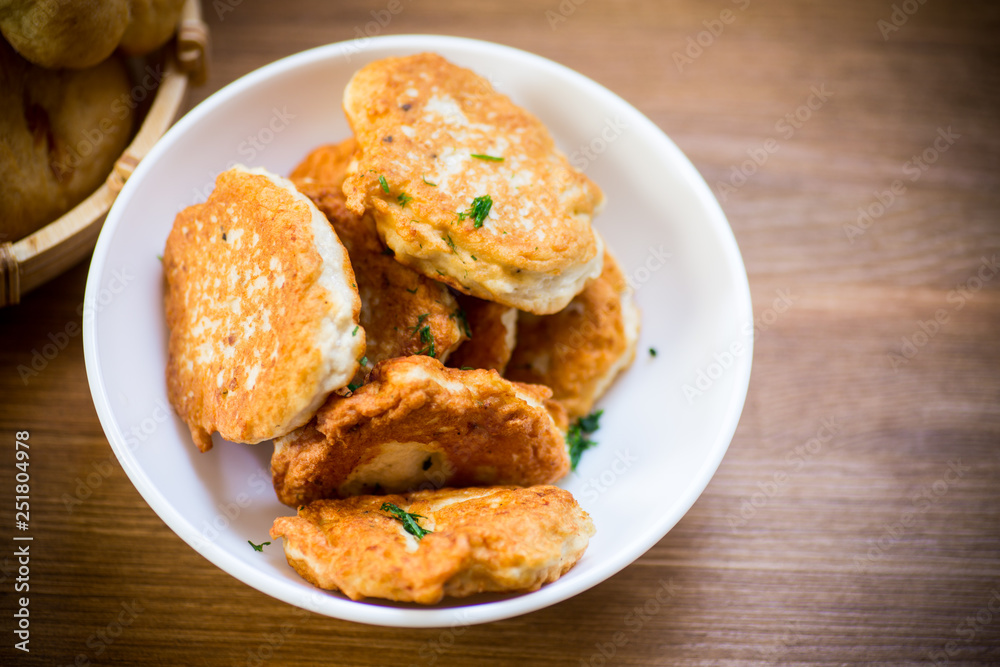 fried chicken cutlets in a white bowl fried chicken cutlets in a white bowl