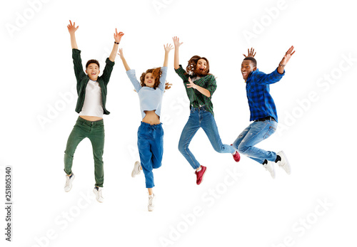 group of cheerful young people men and women isolated on white background.