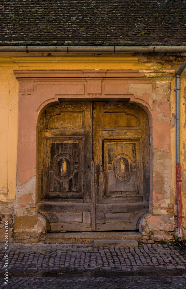An old wooden door in Osijek, Osijek-Baranja County, Slavonia, Eastern Croatia