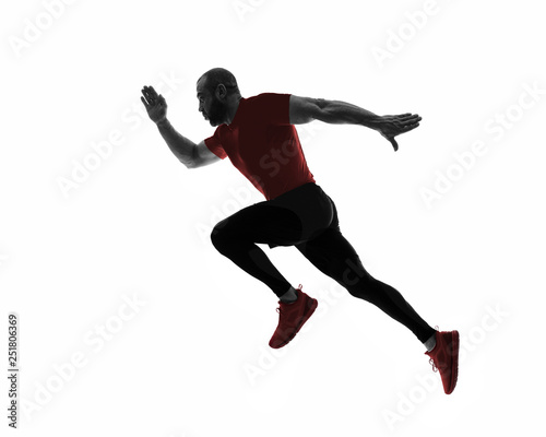 Silhouette of sports man running, isolated on white background