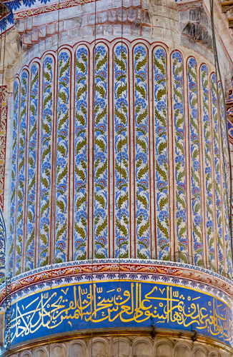Ceramic Blue tile with colorful patchwork dome and praying area, interior
