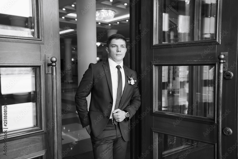 the groom in a wedding suit, a man preparing for the wedding 1 the groom in a wedding suit, a man preparing for the wedding 1