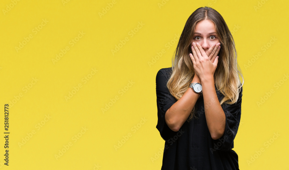 Young beautiful blonde woman over isolated background shocked covering mouth with hands for mistake. Secret concept. Young beautiful blonde woman over isolated background shocked covering mouth with hands for mistake. Secret concept.