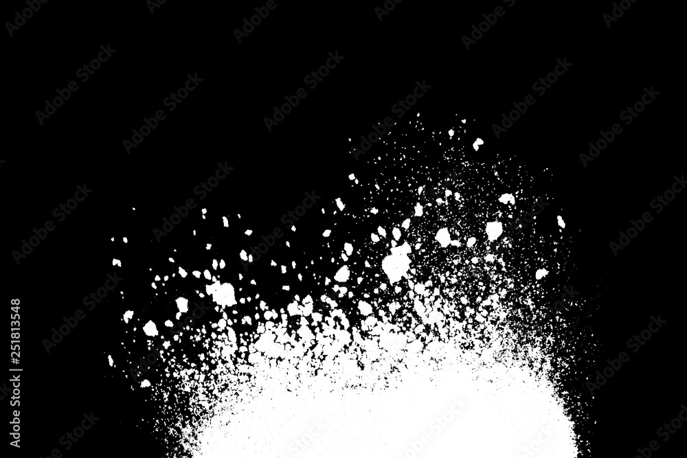 White powder explosion with splash on black background